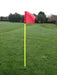 Yellow corner flag pole with red flag